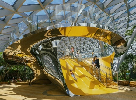 A yellow and silver structure with a glass roof

Description automatically generated with medium confidence