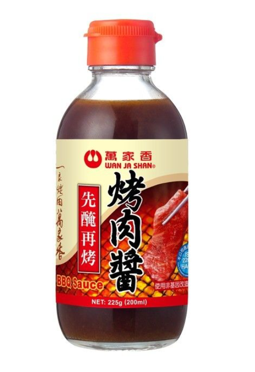 A bottle of sauce with a red label

Description automatically generated